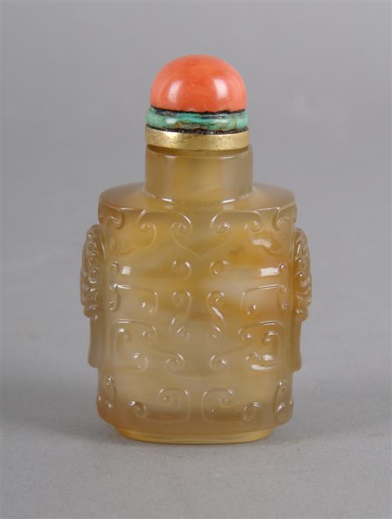 Appraisal: A Chinese Carved Agate Snuff Bottle Height of bottle inches