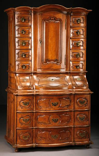 Appraisal: A German Baroque walnut cabinet first quarter th century In