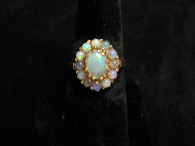 Appraisal: Opal Ring rich blue-green gems in k yellow gold