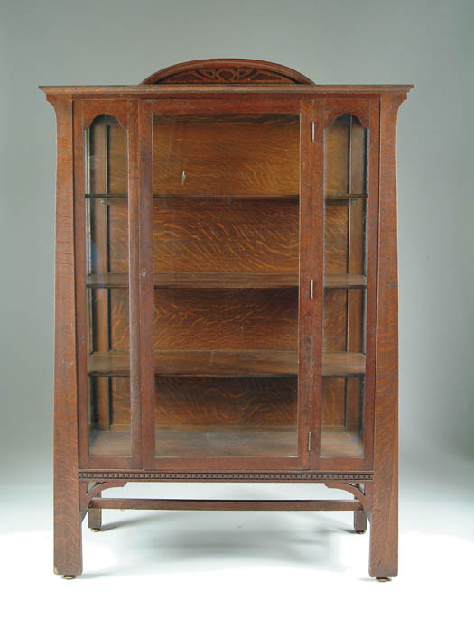 Appraisal: MISSION OAK CHINA CABINET Central glass door four deep shelves