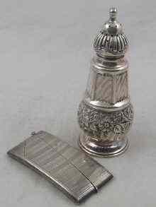 Appraisal: A Victorian silver caster hallmarked for London with embossed floral