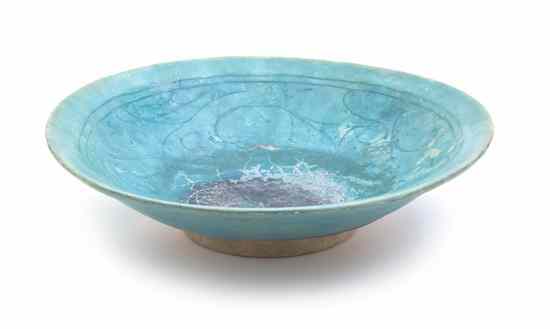 Appraisal: A Middle Eastern Turquoise Glaze Pottery Bowl of flattened conical