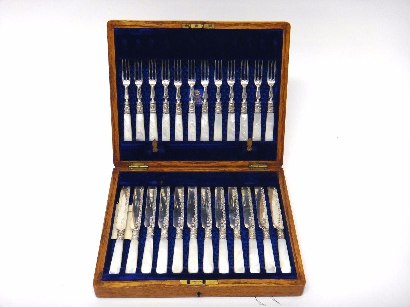 Appraisal: Twelve pairs of silver dessert or fruit knives and forks