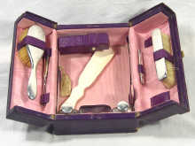 Appraisal: An Asprey vanity case fitted with hallmarked silver hair brush