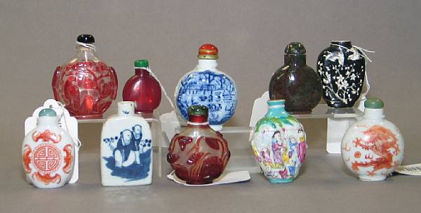 Appraisal: A group of thirteen snuff botlles Comprising seven porcelain snuff