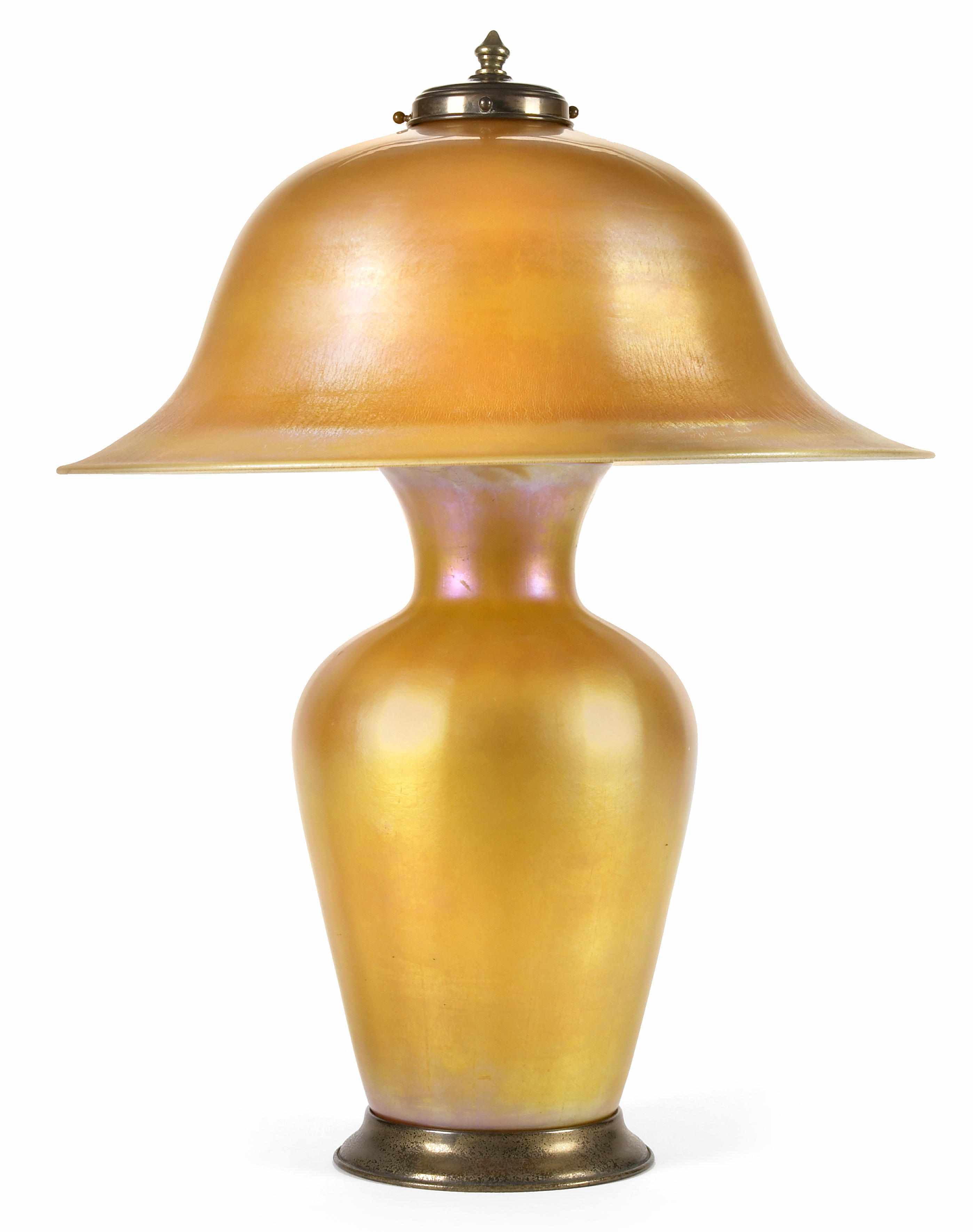 Appraisal: A Quezal iridescent glass lamp pre- intaglio finish to patinated