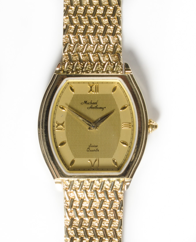 Appraisal: MAN'S FOURTEEN KARAT GOLD DRESS WATCH Michael Anthony featuring a