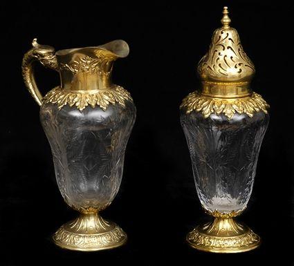 Appraisal: DURGIN SILVER GILT-MOUNTED INTAGLIO CUT-GLASS PITCHER AND MATCHING CASTER Retailed