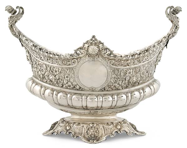 Appraisal: An impressive Edwardian silver center bowl Walker and Hall Sheffield