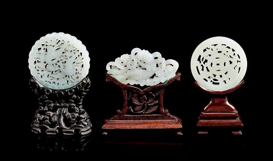 Appraisal: Three Pale Celadon Jade Reticulated Plaques Diameter of largest inches