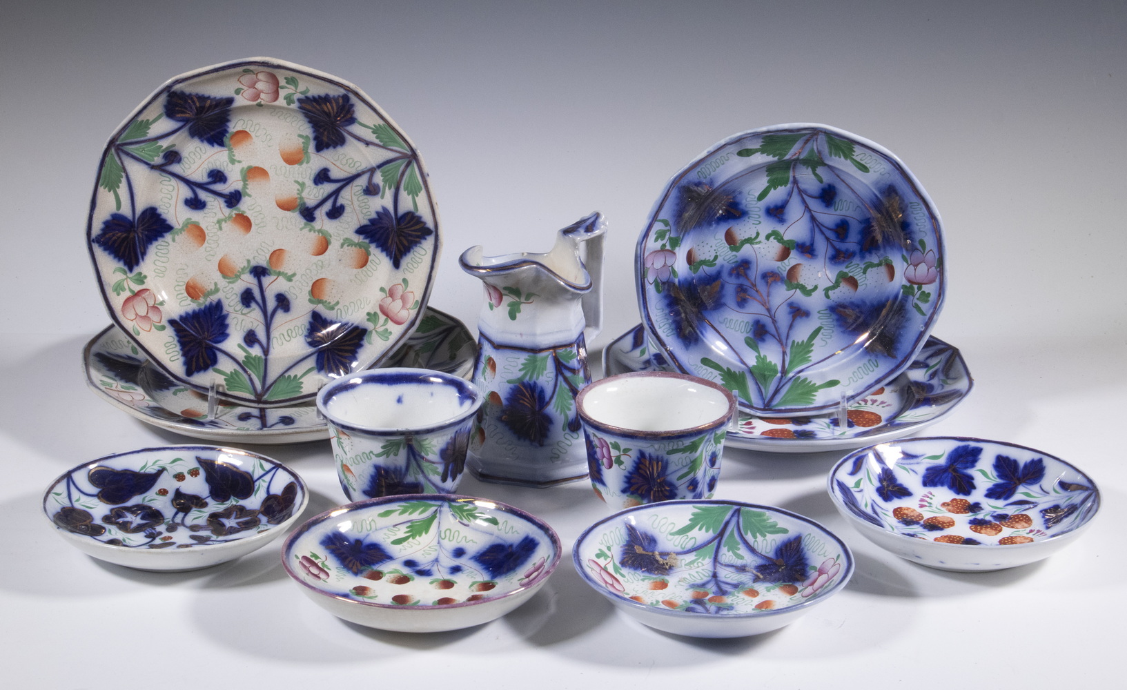 Appraisal: GAUDY WELSH FLOW BLUE DISHES Piece Collection of Victorian Tableware