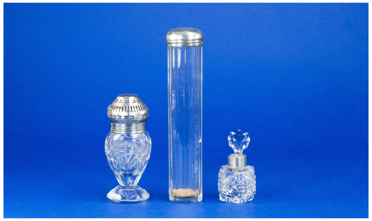 Appraisal: Three Silver Topped Rimmed Glass Bottles Comprising Scent Bottle London