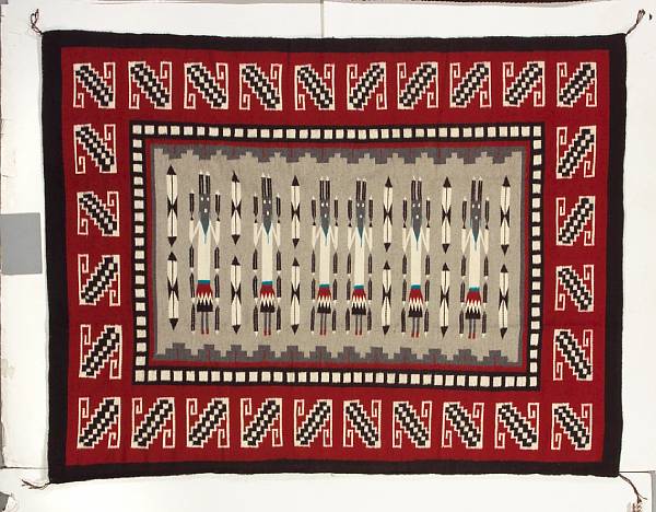 Appraisal: A Navajo Yei rug Annie D Kaye depicting six Yei