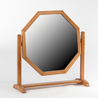 Appraisal: Heals an octagonal oak dressing table mirror on a swing-frame