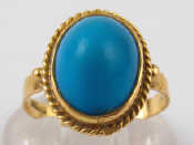 Appraisal: A yellow metal tests high carat gold turquoise ring turquoise