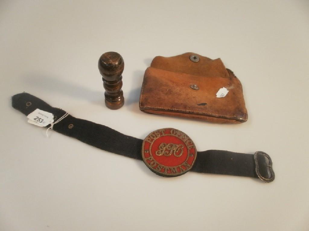 Appraisal: A thC GPO postman tie badge an oak seal with