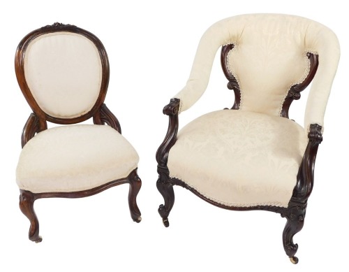 Appraisal: A Victorian mahogany nursing chair upholstered in cream and white