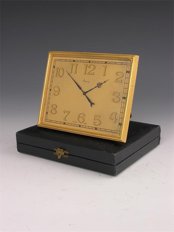 Appraisal: Asprey A gilt brass strut timepiece