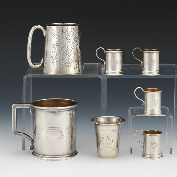 Appraisal: STERLING SILVER CUPS AND TANKARDS Two tankards and four handled