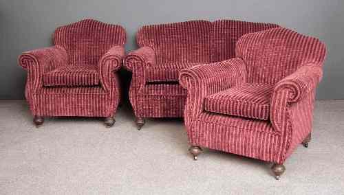 Appraisal: A s three piece lounge suite with shaped backs and