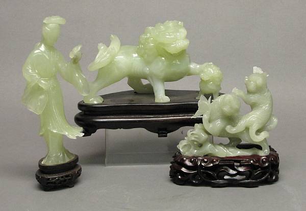 Appraisal: Three jade and hardstone carvings Including a serpentine figure of