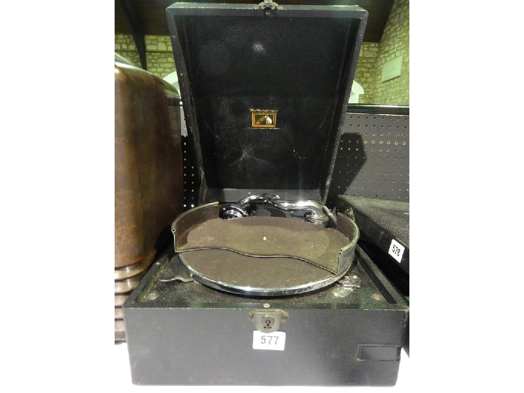 Appraisal: An HMV portable record player with chromium plated arm and