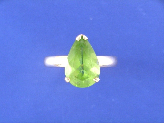 Appraisal: A ct gold peridot dress ring ring size K gms