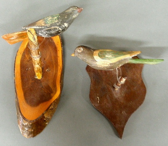 Appraisal: - Two Continental carved wood and paint decorated birds on