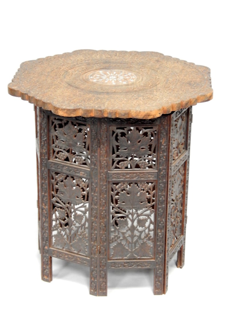 Appraisal: A late thC Indian and carved inlaid circular occasional table