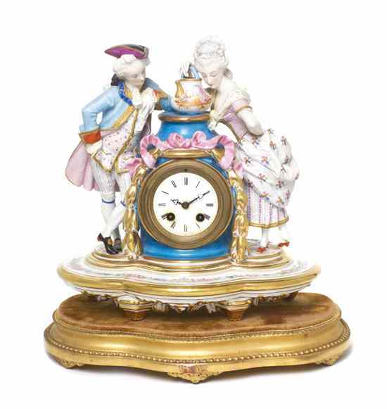 Appraisal: A French Bisque Porcelain and Gilt Metal Mounted Figural Clock