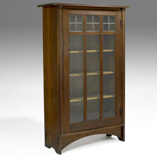 Appraisal: GUSTAV STICKLEYSingle-door bookcase no designed by Harvey EllisLarge red decal