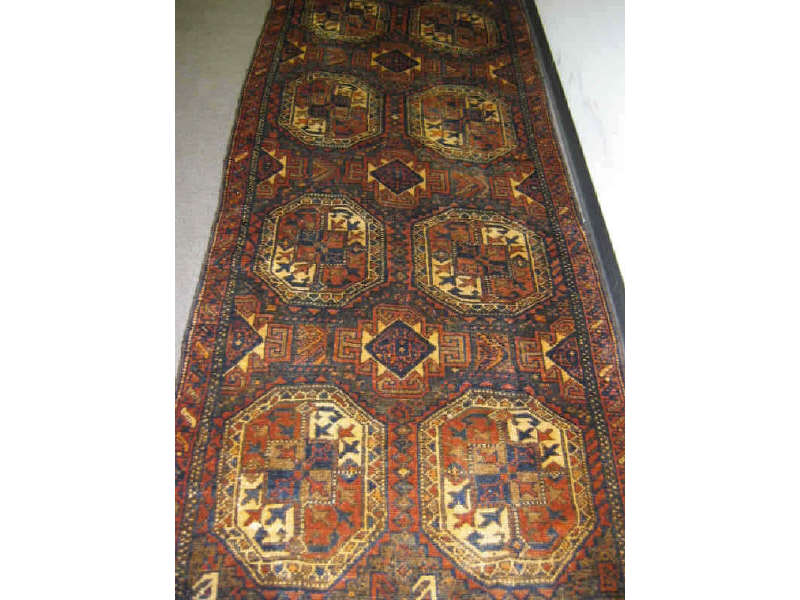 Appraisal: SHIRAZ RUNNER The camel brown and olive field of geometric