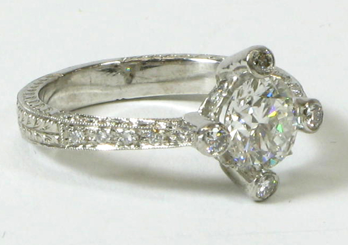 Appraisal: DIAMOND AND EIGHTEEN KARAT WHITE GOLD RING WITH APPRAISAL centering