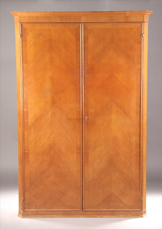 Appraisal: AUSTRIAN BIEDERMEIER STYLE BIRCH ARMOIRE early th century Molded-edge crown