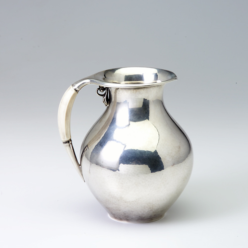 Appraisal: Georg Jensen Denmark Sterling pitcher with ivory handle no