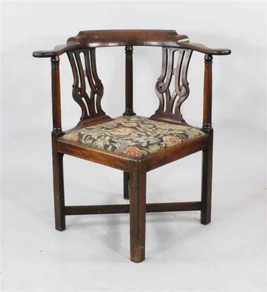 Appraisal: A George III mahogany elbow chair with pierced splats and