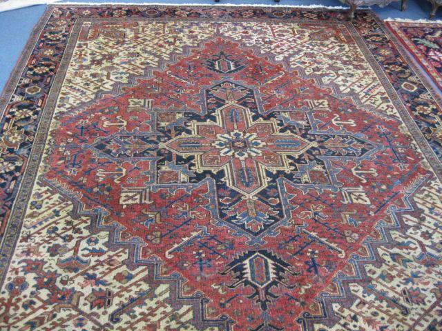 Appraisal: Heriz Persian Handmade Room Size Rug stunning geometric designs deep