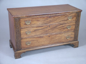 Appraisal: A mahogany chest of drawers th century the top above