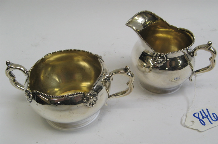 Appraisal: AMERICAN STERLING SILVER CREAM AND SUGAR SET beaded rims with