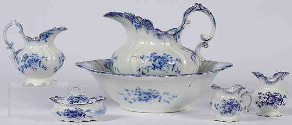 Appraisal: Flow Blue Wash Set English a blue and white decorated