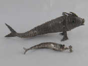 Appraisal: A fine articulated silver fish container standing on two fins