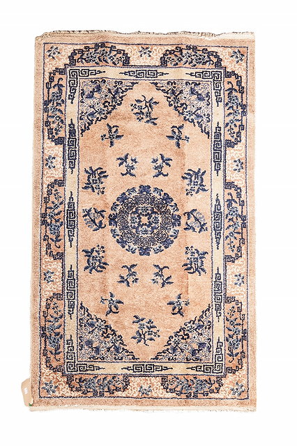 Appraisal: AN OLD CHINESE BEIGE GROUND RUG with blue foliate and