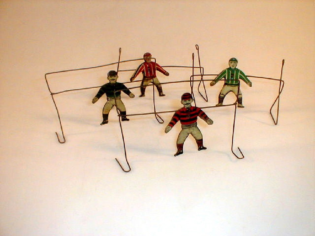 Appraisal: A set of lithographed tin plate early footballers