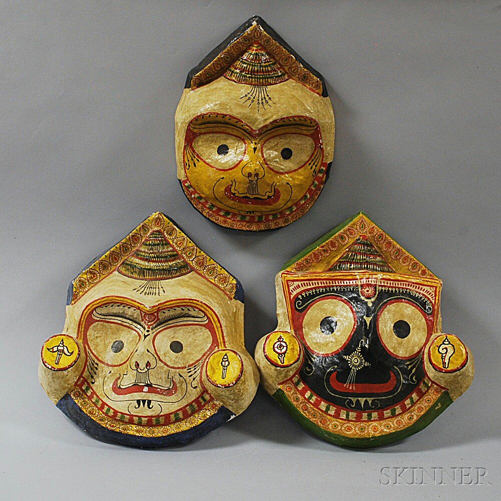 Appraisal: Three Indian Papier-mache Masks Orissa style painted in bright primary