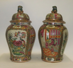 Appraisal: PAIR OF HEAVY CHINESE PORCELAIN COVERED TEMPLE JARS hand enameled