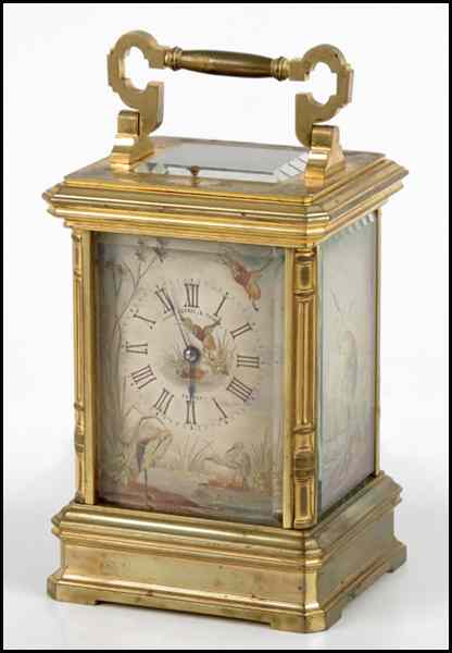 Appraisal: FRENCH GILT BRONZE CARRIAGE CLOCK Face reads ''Ellis Depree Tucker