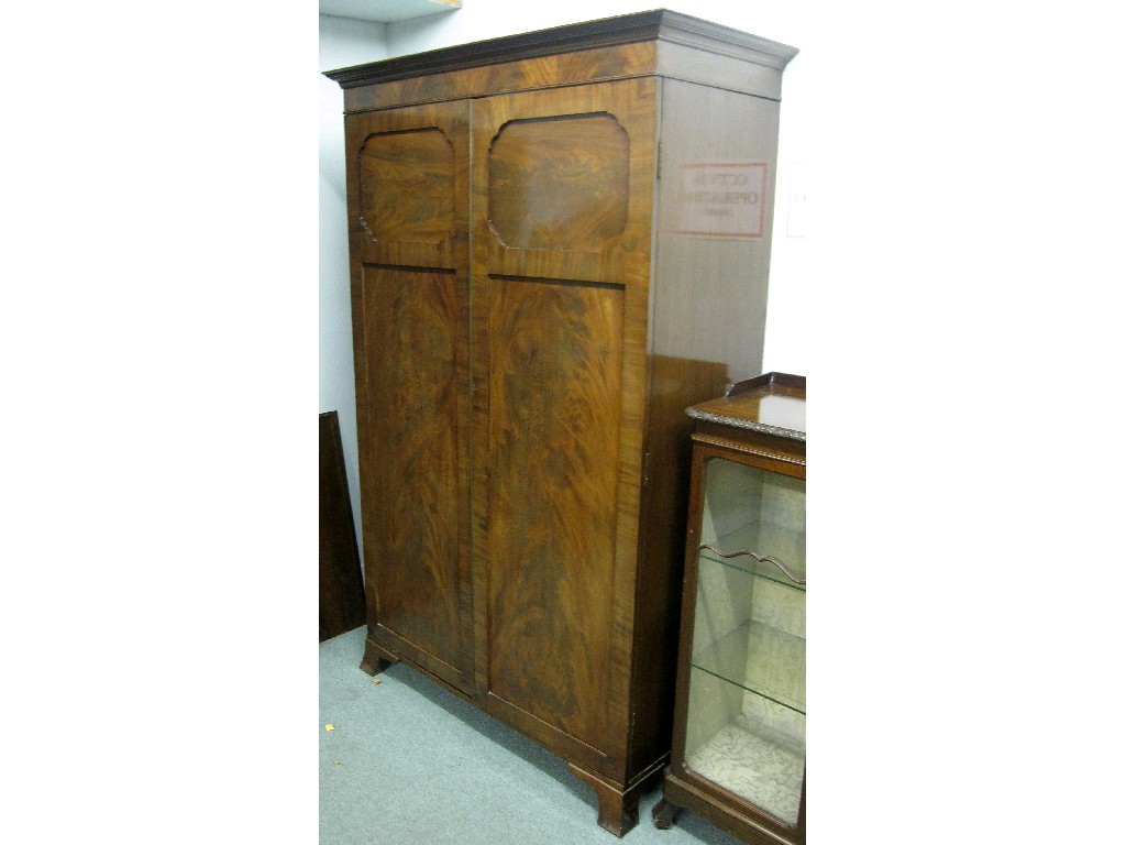 Appraisal: Georgian style mahogany panel door wardrobe