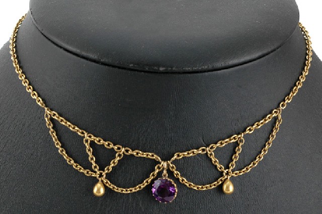 Appraisal: An Antique amethyst necklace The festoon style necklace having swags