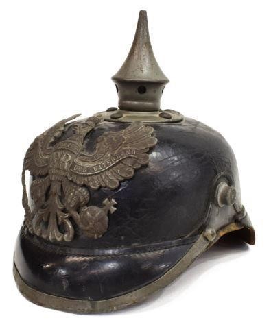 Appraisal: German pickelhaube helmet fitted with metal front plate depicting the