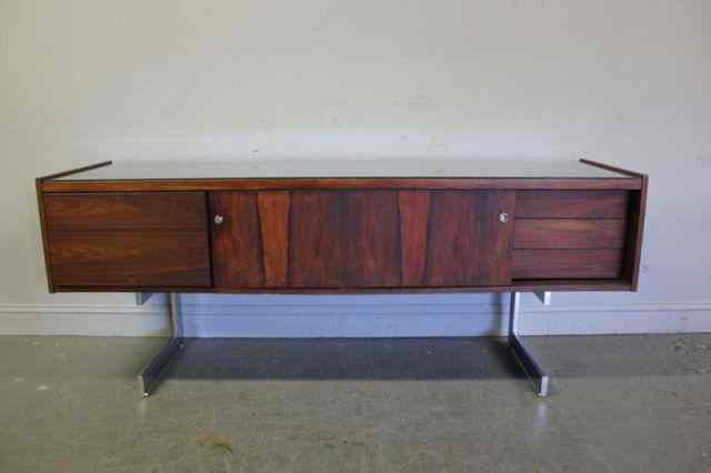 Appraisal: Midcentury Rosewood and Chrome Credenza With drawers and sliding doors